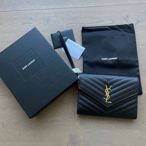 Saint Laurent new pouch monogram with removable strap